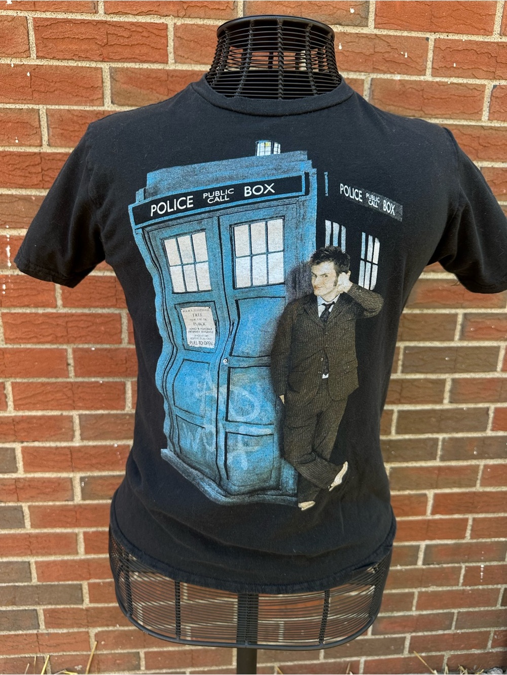 Ripple Junction Black Short Sleeve Tee with Blue TARDIS and Character Print